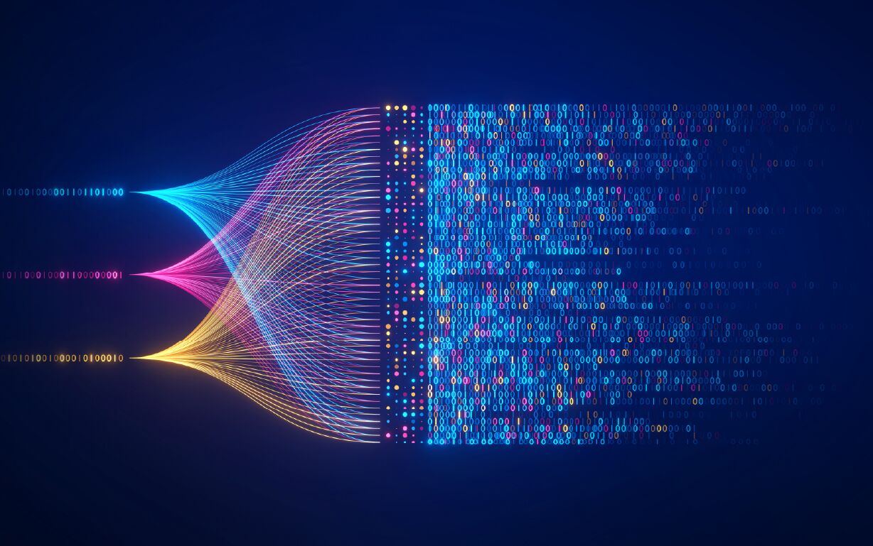 An illustration of three streams of 1s and 0s in blue, pink, and yellow, splitting and recombining to form a large number of multicolored streams.